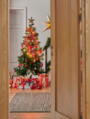 Close up wooden open door style and Christmas tree gift box background, new year concept.