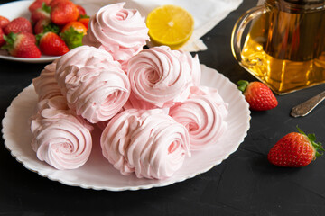 Traditional marshmallows on a plate on the kitchen table