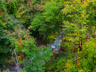 River of sulfur springs flowing through a hot spring town (Zao, Yamagata, Japan)