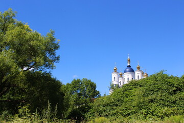 view of the central church near the entrance to the Svensky ancient Russian monastery in summer...