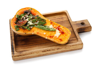 Wooden board with tasty stuffed pumpkin on white background