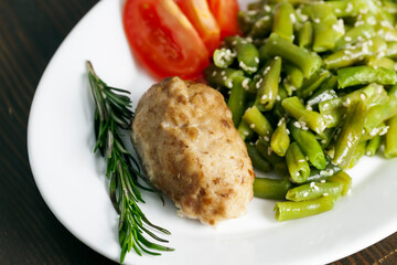 baked asparagus beans with sesame seeds and meat cutlet