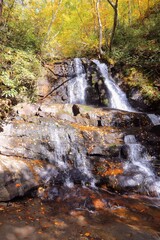 waterfall in autumn forest