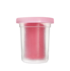 Plastic container of pink play dough isolated on white