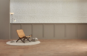 Decorative chair is in front of the white brick and under classic brown wall background, parquet floor, lamp style.