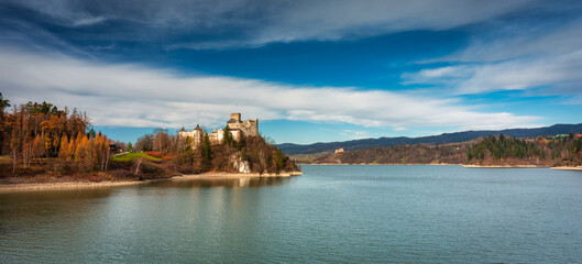 Fototapeta na wymiar Medieval Castle in Niedzica with a reflection in the Czorsztyn Lake. Poland