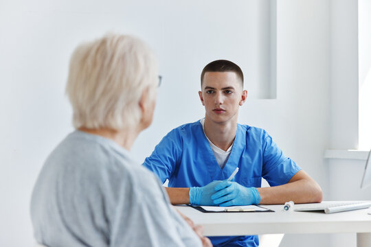 elderly patient talking to the doctor health and medicine