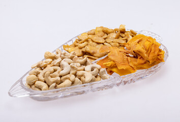 Roasted and salted fava beans, cashew nuts and dried mango slices for a healthy vegan and...