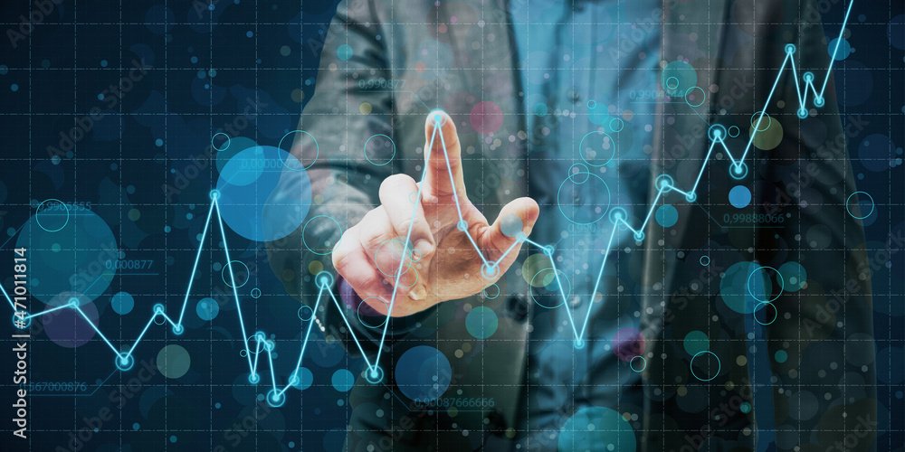 Poster close up of businessman hand pointing at abstract glowing business chart on blurry grid background. 