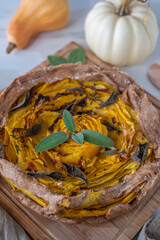 Fototapeta premium home made pumpkin quiche lorraine on a table