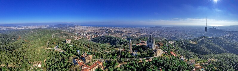 Drone panorama over Catalan metropolis Barcelona taken from Tibidabo direction during the day