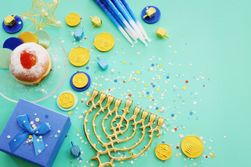 Religion image of jewish holiday Hanukkah background with menorah (traditional candelabra), spinning top and candles