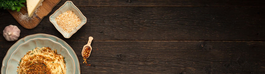 PASTA with BREADCRUMBS Like an Italian (Pasta Ca' Muddica) and ingredients with copy space banner