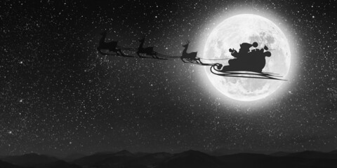 silhouette of a flying goth santa claus against the background of the night sky. Elements of this...