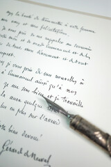 Old fashion writing sample with different writing techniques, papers, styles and calligraphy nibs.