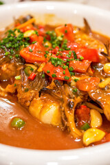 A delicious specialty of Guilin, Guangxi, China, braised tomato and beer fish