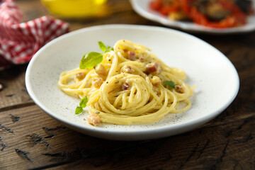 Traditional pasta Carbonara with egg and pork