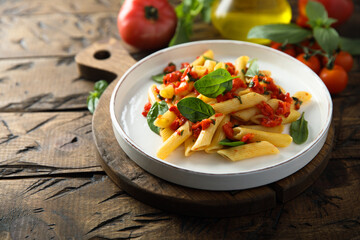 Traditional Italian pasta with tomatoes and basil