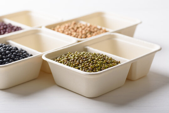 Mungbeans in compostable cardboard boxes are eco-friendly concepts and are mainly used as a plant-based ingredient in vegetarian, healthy food.