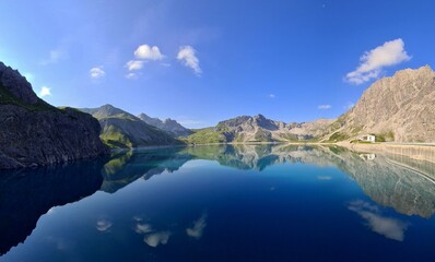 Mountains mirroring in Lunersee in the morning, Austrian Alps