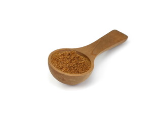 Garam Masala spice in a wooden spoon isolated on white background. Indian spice mix. 