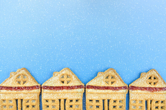 Christmas simple cookies in the shape of houses.