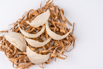 Top Grade edible bird nest shoot on white background with negative space. Raw edible bird's nest...
