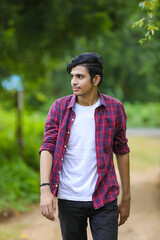 Fototapeta premium Young indian college student showing expression.