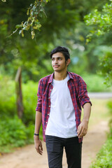 Fototapeta premium Young indian college student showing expression.