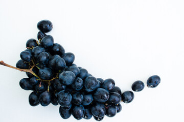 bunch of grapes on a black background