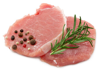 sliced raw pork meat with rosemar and peppercorn isolated on white background. Clipping path and full depth of field