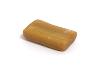 Piece of household soap on a white background, isolate.