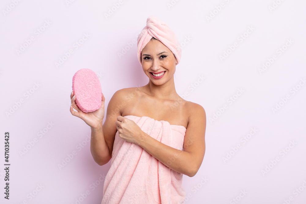 Wall mural asiatic pretty woman feeling happy and facing a challenge or celebrating. bathrobe and sponge concept