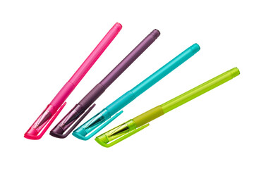 A set of colored ballpoint pens with closed caps, isolated on a white background. Stationery for school and office. Banner, advertising. Space for copying.