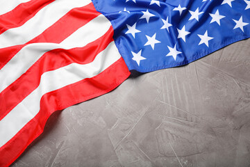 Obraz premium American flag on light grey background, top view. Space for text