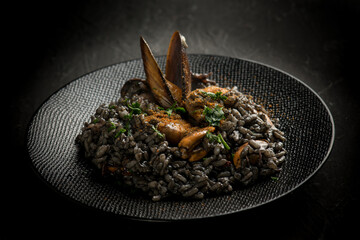 risotto with black ink squid shrimp mussels and bottarga eggs