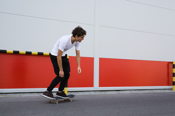 young man skater riding skate