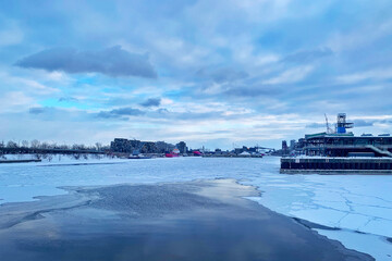 Frozen Saint Laurent river in winter in the port of Montreal