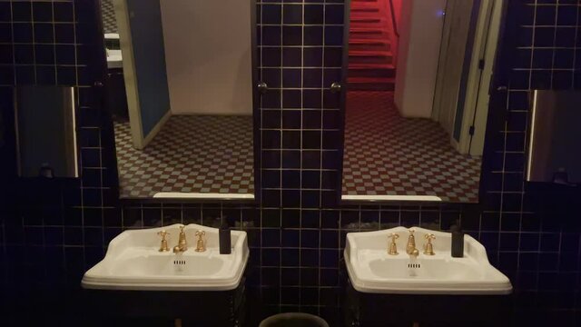 Sinks and mirror in restroom