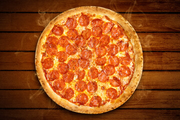 Pizza pepperoni top view. Hot Pizza salami and mozzarella cheese on wooden background for pizzeria banner. Flat lay