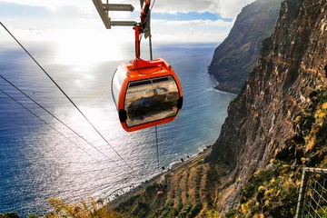 Foto auf Glas Road from the sky to the beach - mountain cable car Cabo Girao, popular tourist attraction and beautiful scenery in Madeira island © Freesurf