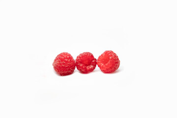 Ripe raspberry berry on a white isolated background. blur, Soft focus, selective focus. 