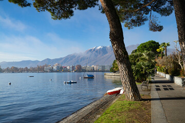 Fototapeta na wymiar Tcino,ascona,locarno,bellinzona,lugano,mendrisiotto, From the palms to the glaciers. The Lake Maggiore area, and its surrounding valleys, will amaze you with its variety. A mild climate,exotic flora