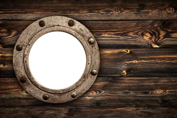 Foto op Plexiglas Schip Close-up van een oud roestig gesloten leeg patrijspoortvenster. Oude rijke houtnerf textuur achtergrond met knopen.