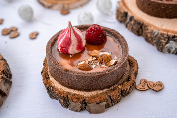 caramel tartlet with raspberries and nuts