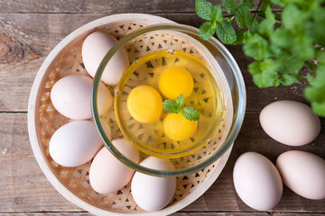 Eggs on wooden table. Brown eggs 