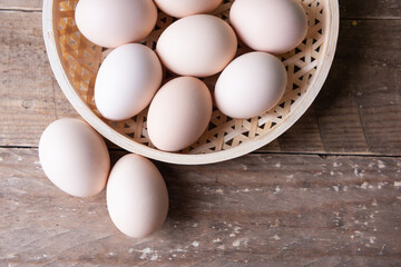 Eggs on wooden table. Brown eggs 