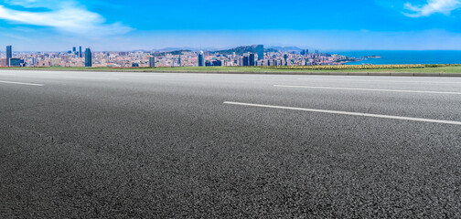 Fototapeta premium Empty asphalt road and city skyline and building landscape, China.