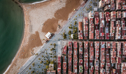 Aerial view of a residential area in Barceloneta district of Barcelona along the beach, Spain.