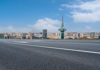Fototapeta premium Empty asphalt road and city skyline and building landscape, China.
